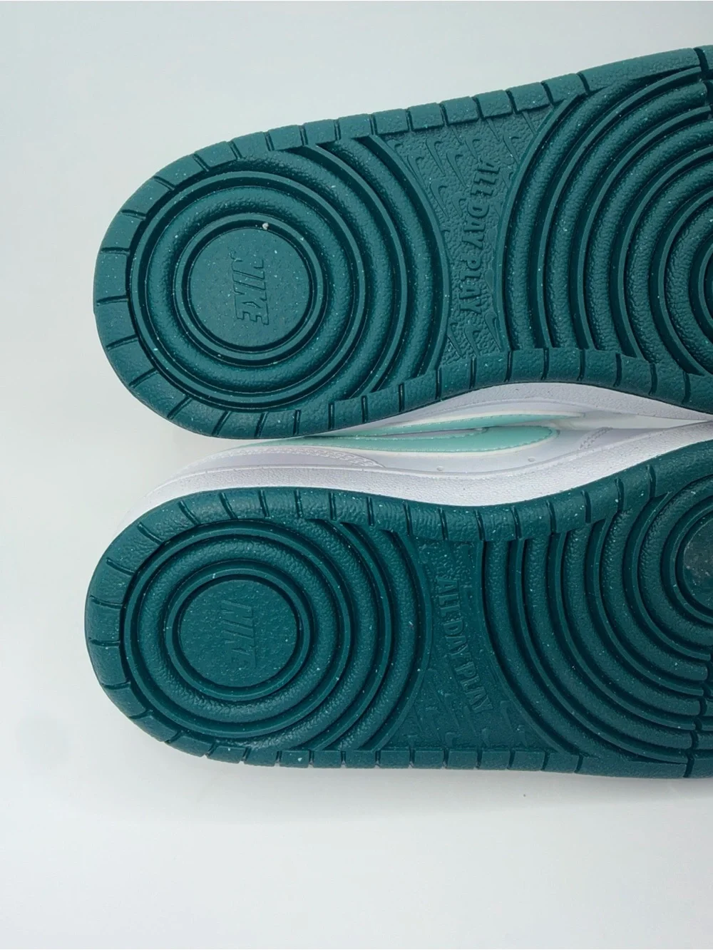 Nike Kids White Sneakers with Mint Green Swoosh